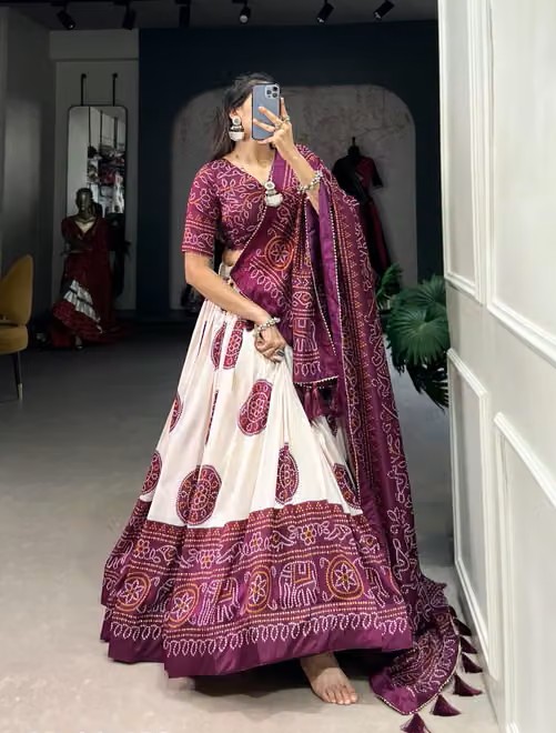 Patola printed navratri chaniya choli with Stitched Blouse — white silk Lehengas, front view